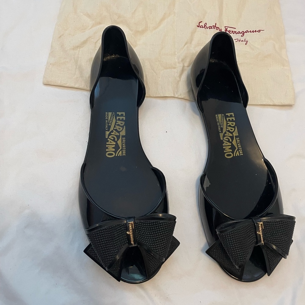 Black Salvatore and Ferragamo bow flats